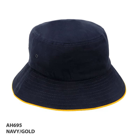 A navy bucket hat with a gold trim and an inner logo on the side. Suitable for outdoor wear.